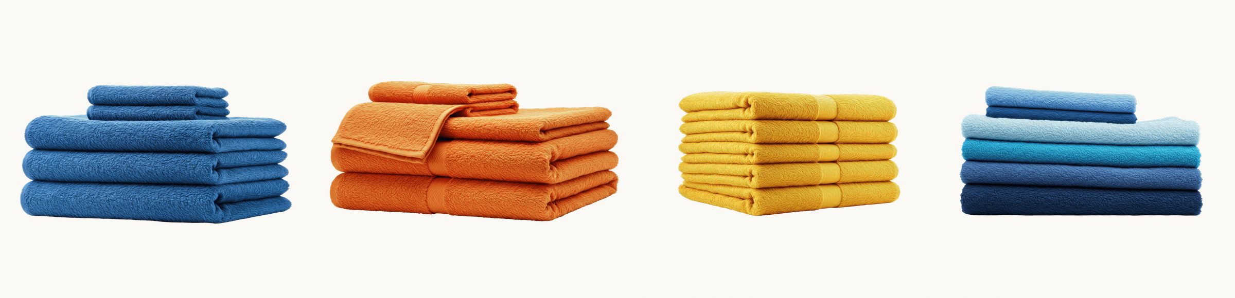 Stacks of folded towels in blue, orange, yellow and teal on a neutral background